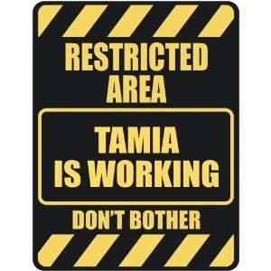   RESTRICTED AREA TAMIA IS WORKING  PARKING SIGN: Home 