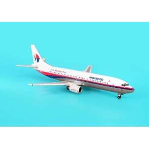   Phoenix Malaysia 737 400 1/400 Visit Malaysia REG#9M MMN Toys & Games