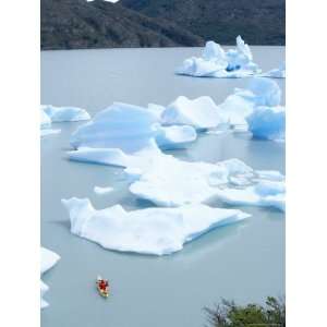 Person Kayaking Between Floating Icebergs, Lago Gray, Torres Del Paine 