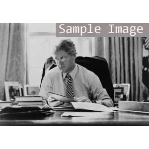  1993 Bill Clinton, half length portrait, seated at desk 