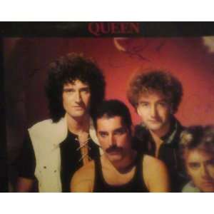   Band Members W/COA (no vinyl) Freddie Mercury, Brian May, John Deacon