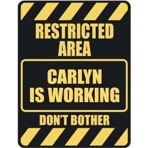   RESTRICTED AREA CARLYN IS WORKING  PARKING SIGN: Home 