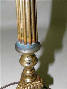We are pleased to be offering this amazing figural brass candlestick 