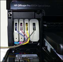 Install compatible cartridges into the printer matching the colors.