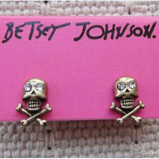 The listing is for 4pair BETSEY JOHNSON STUD EARRINGS.