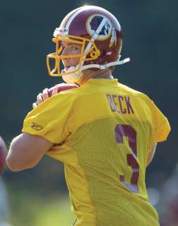 Washington Redskins quarterback John Beck throws a pass during the NFL 