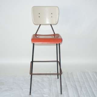   stool fiberglass seating white back rests and orange fiberglass seats