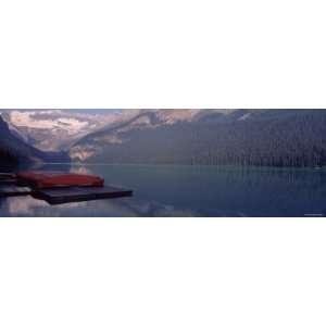 Red Canoes Stationed on a Pier, Lake Louise, Banff National Park 