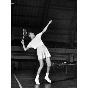 Tennis Player Althea Gibson, Serving the Ball While Playing Tennis 