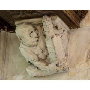 Architect Cass Gilbert holds the Woolworth building in this marble 