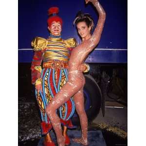 Model Elle Macpherson Posing with Circus Performer 